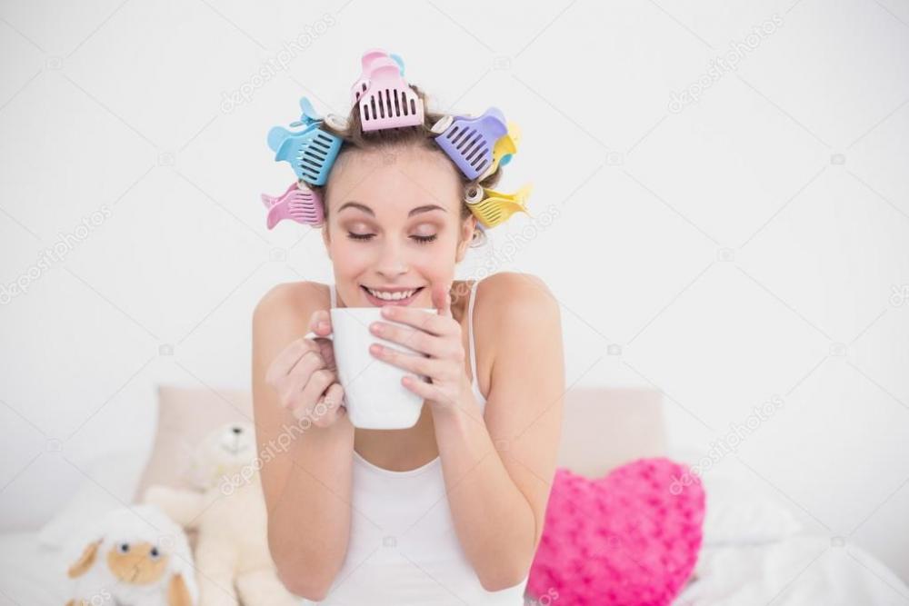 depositphotos_33422491-stock-photo-funny-woman-in-hair-curlers.jpg