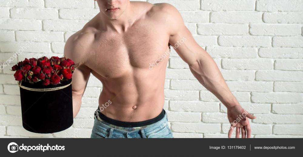 depositphotos_131179402-stock-photo-sexy-muscular-man-with-roses.jpg